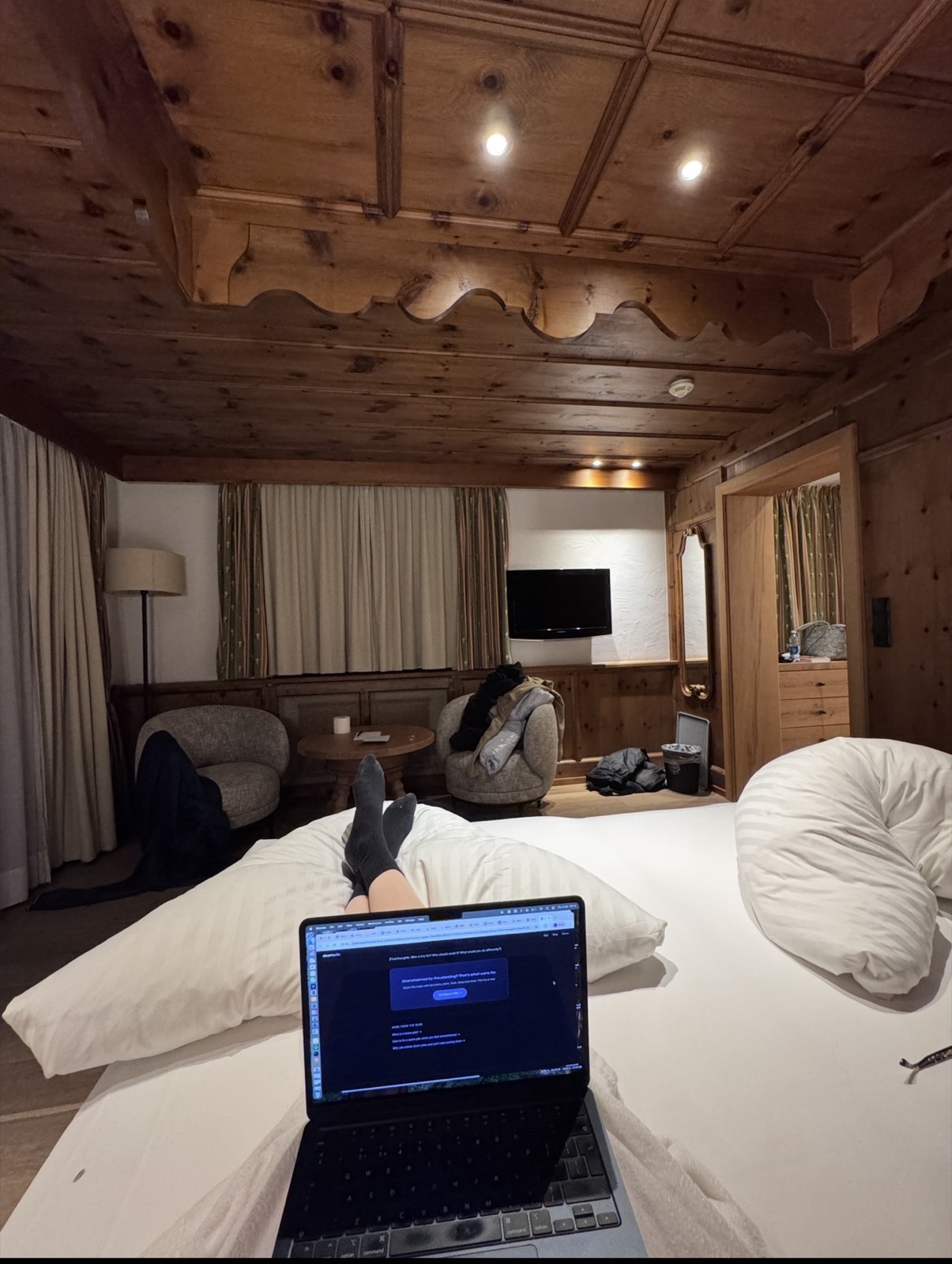 Room at the Elisabeth Hotel with large bed and wooden interiors